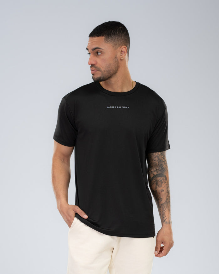 Apex Tech Tee in Black, front on model
