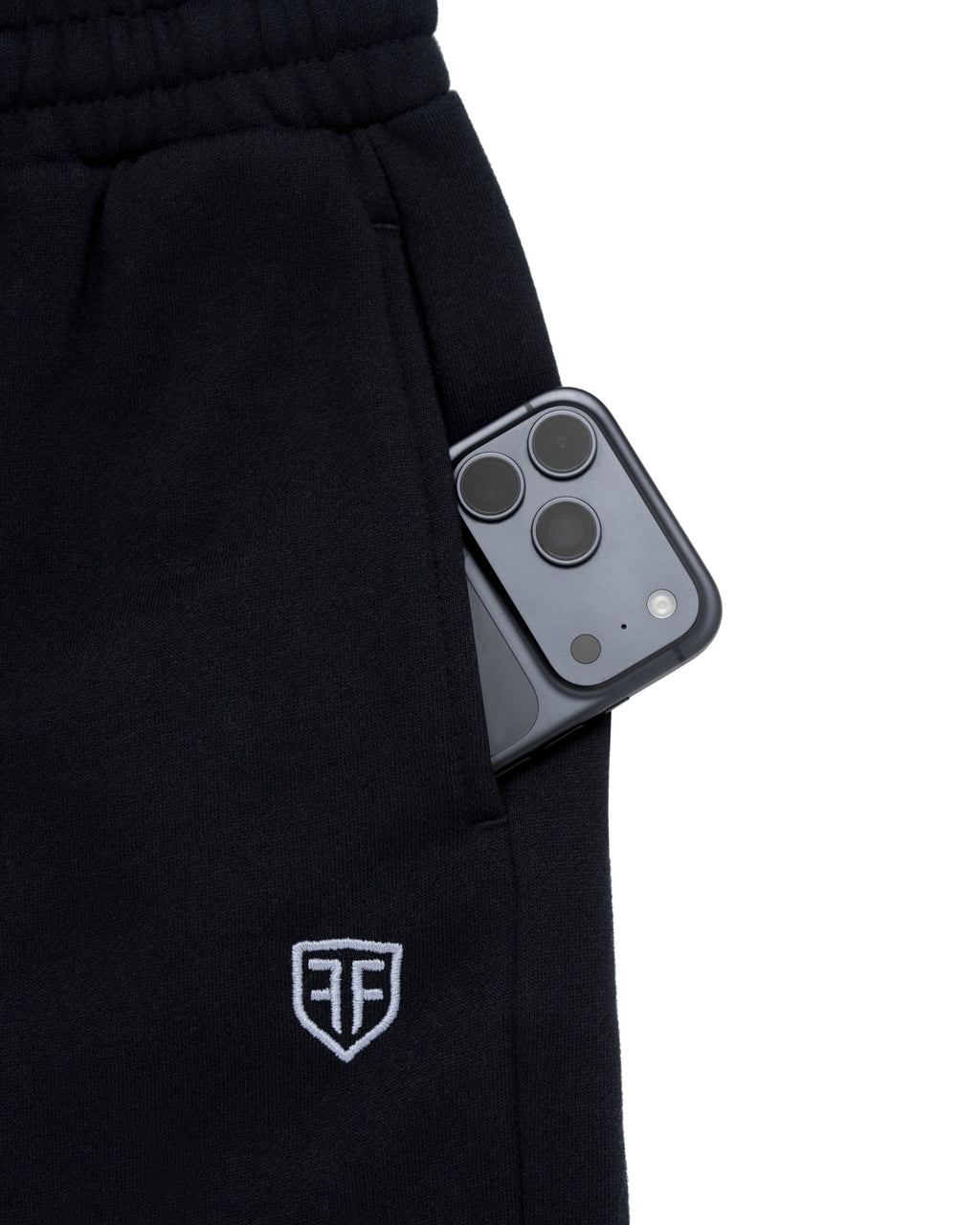 Anchor Midweight Jogger in Black, side phone pocket and embroidered shield