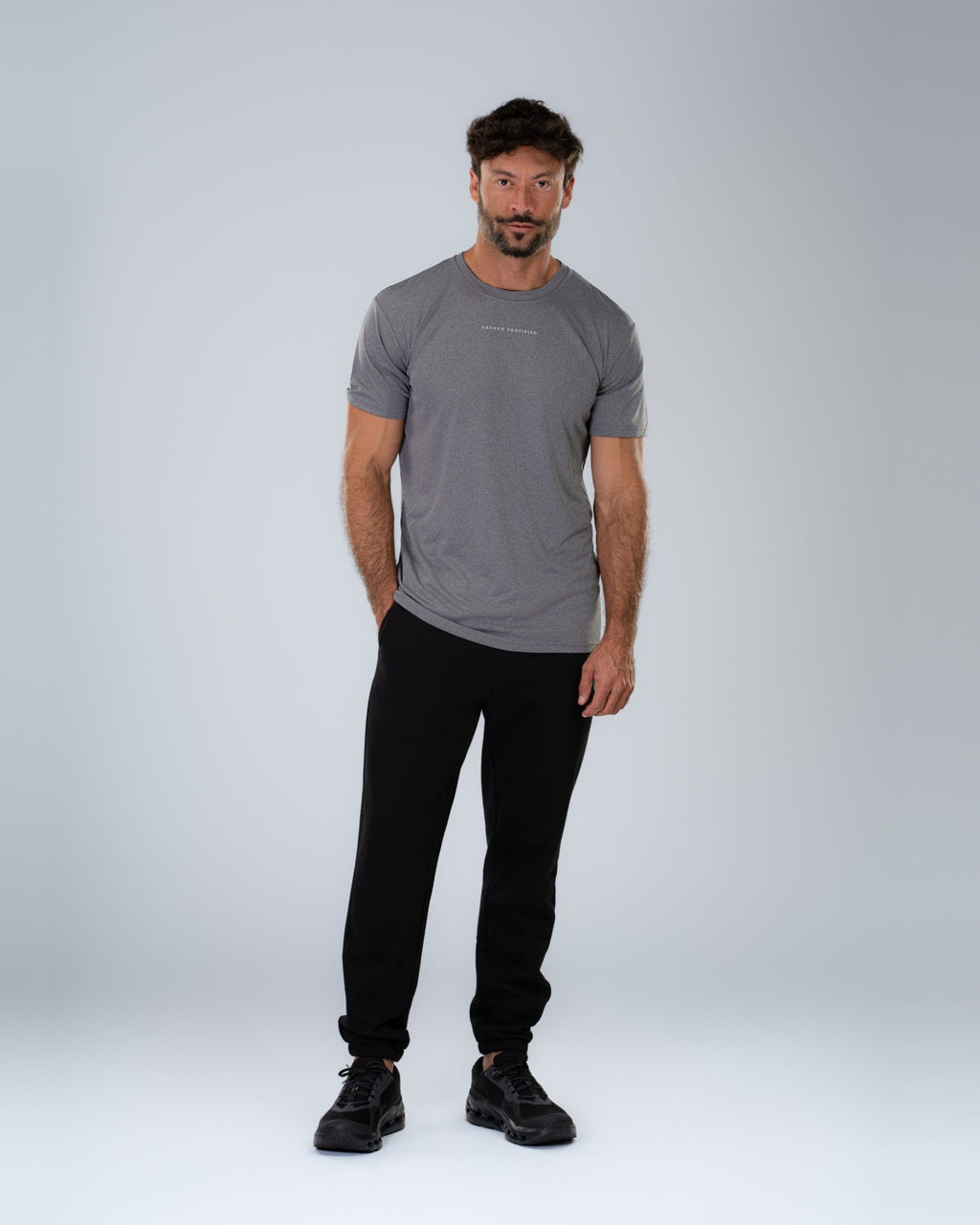 Anchor Midweight Jogger in Black, full-length front on model