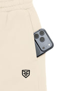 Anchor Midweight Jogger in Ecru, zip phone pocket and embroidered shield