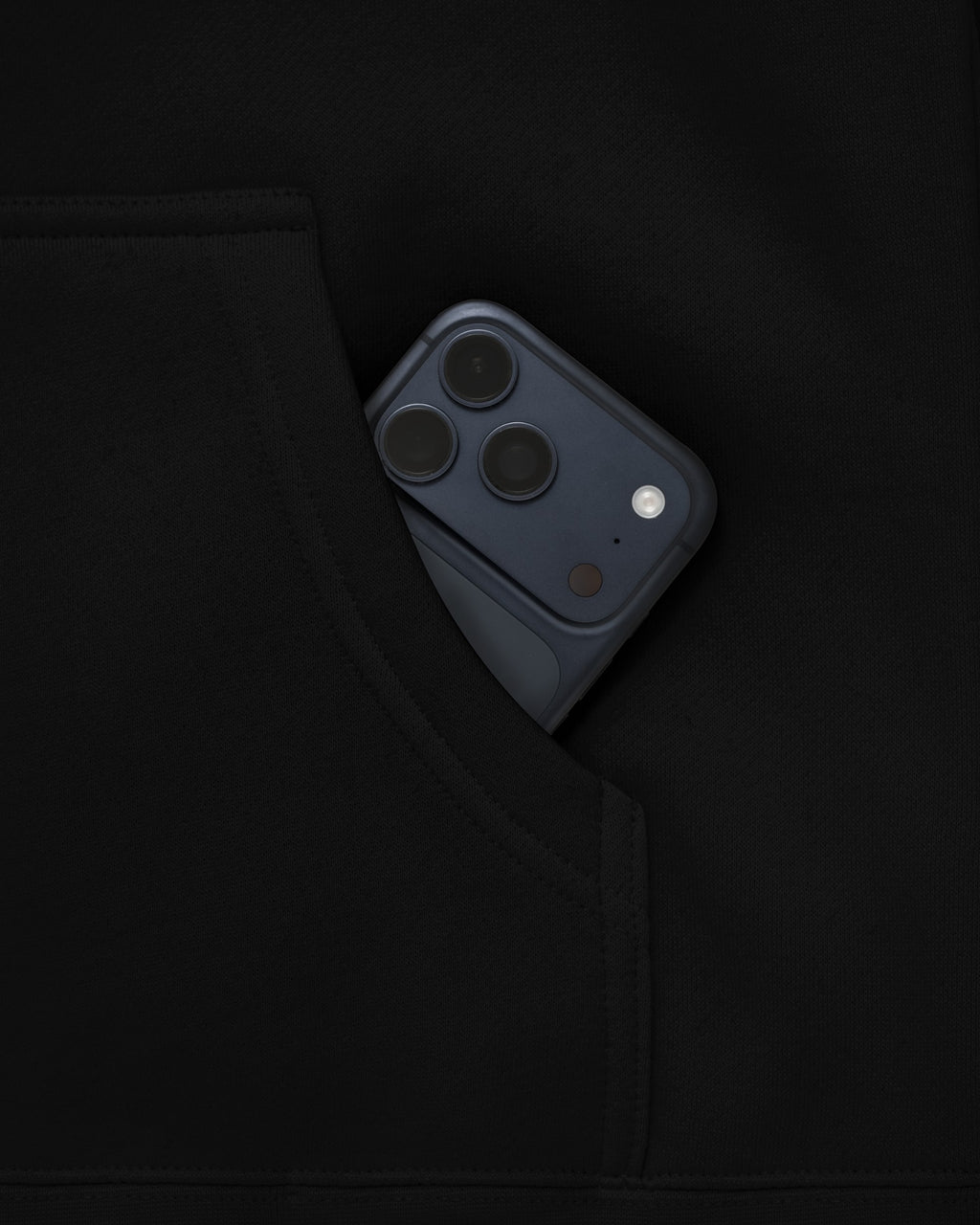 Anchor Midweight Pullover in Black, kangaroo pocket holds a phone