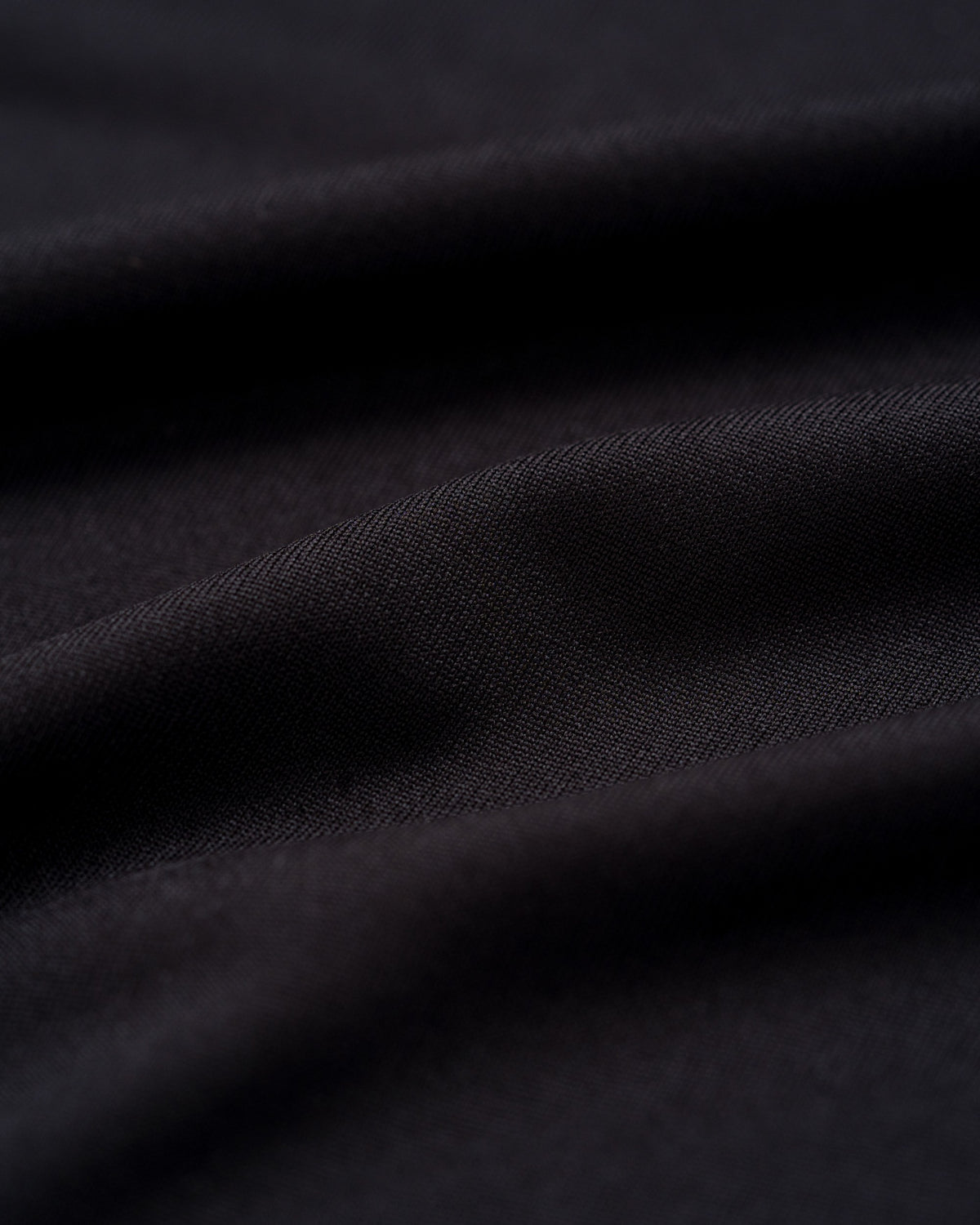 Apex Tech Tee in Black, fabric close-up