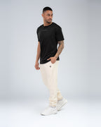 Apex Tech Tee in Black, full-length front on model