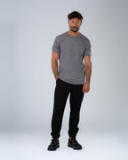Apex Tech Tee in Graphite, full-length front on model