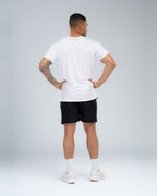 Apex Tech Tee in White, full-length back on model