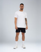 Apex Tech Tee in White, full-length front on model