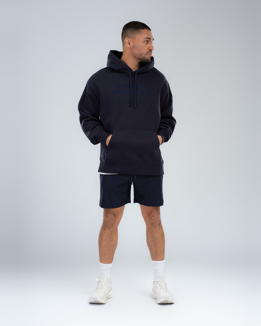Core Short 6.5" in Midnight, full-length front on model