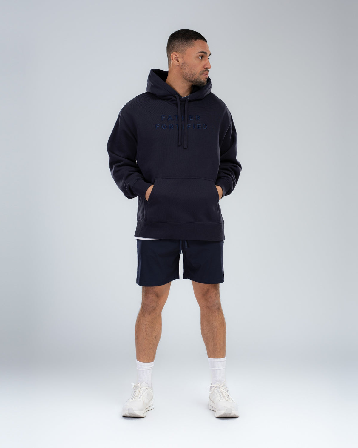 Core Short 6.5" in Midnight, full-length front on model