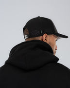 Legacy Signature Cap in Black, back view on model