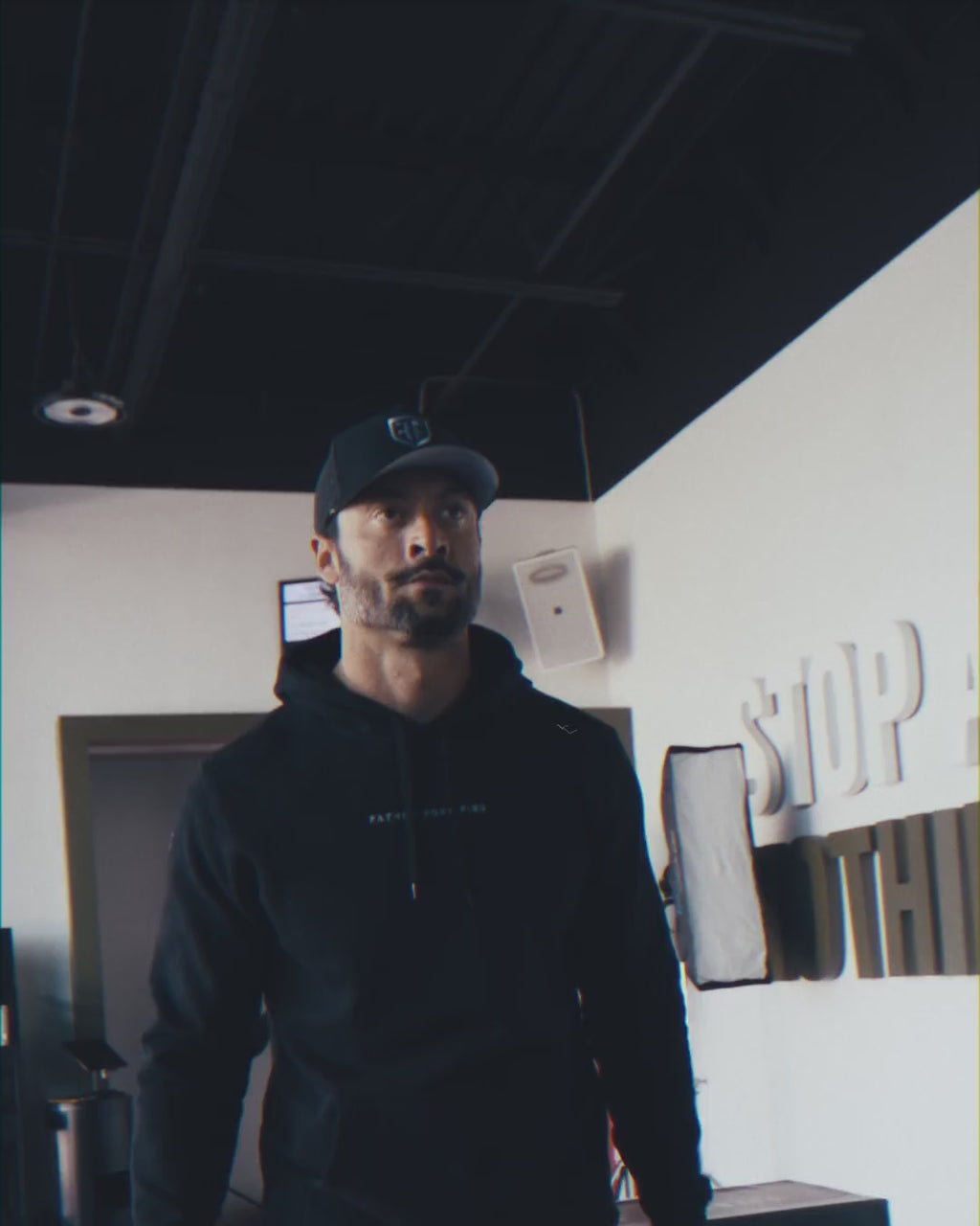 Anchor Midweight Pullover in Black, on the move